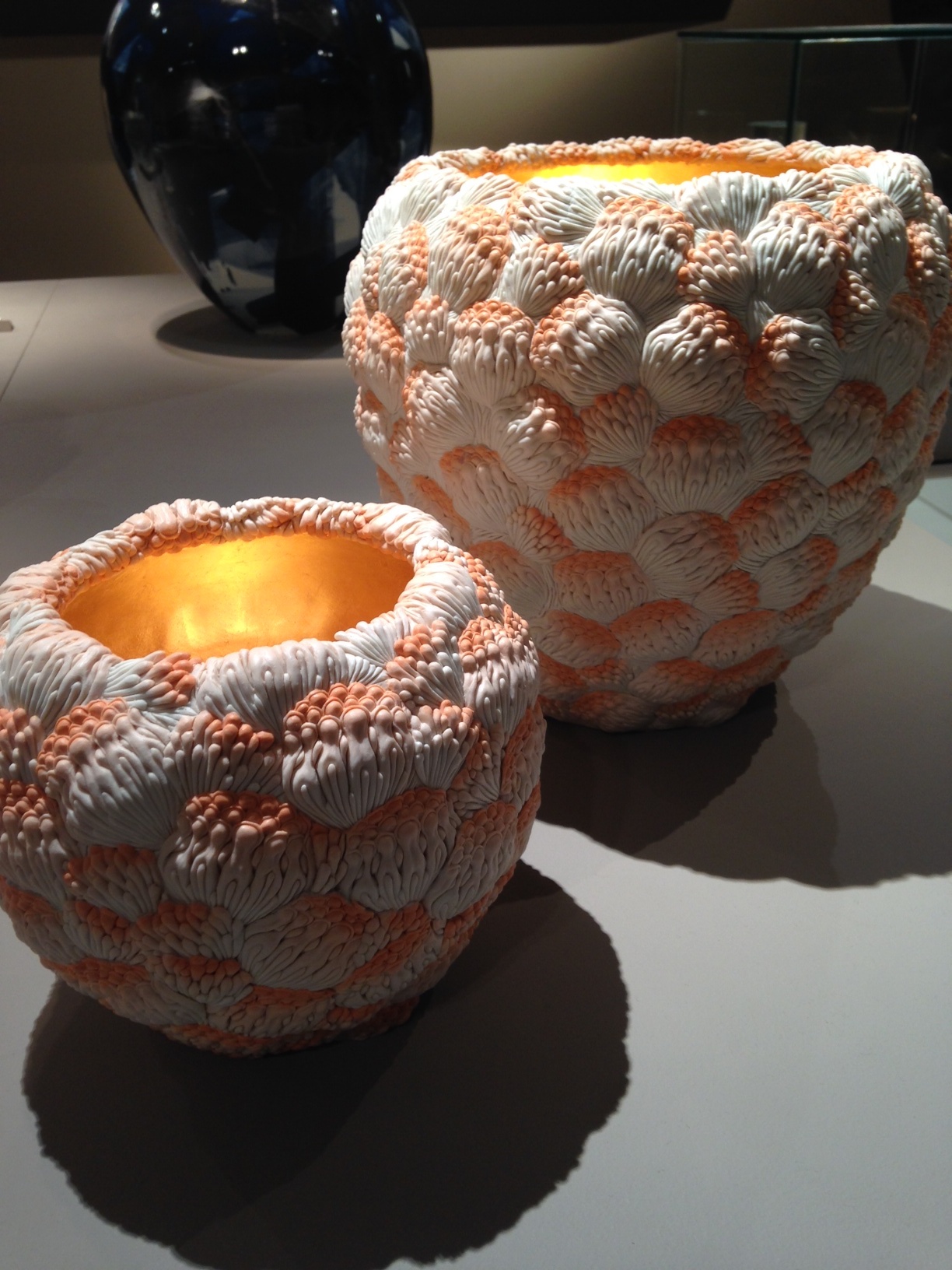 Hitomi Hosono's Orange Coral Bowls, 2014, Molded, carved, and hand-built colored porcelain with red gold leaf interior. Adrian Sasoon Gallery, London.